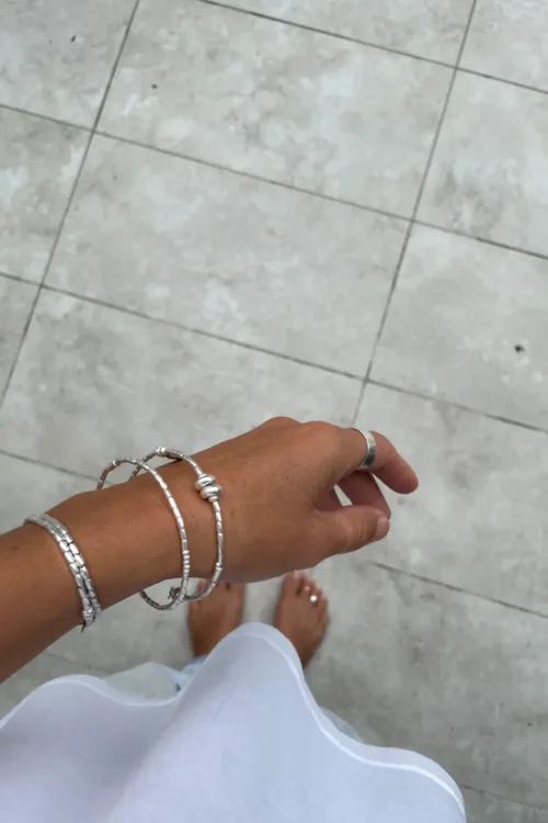 memory wire double wrap bracelet with pure silver and customisable charm pendant