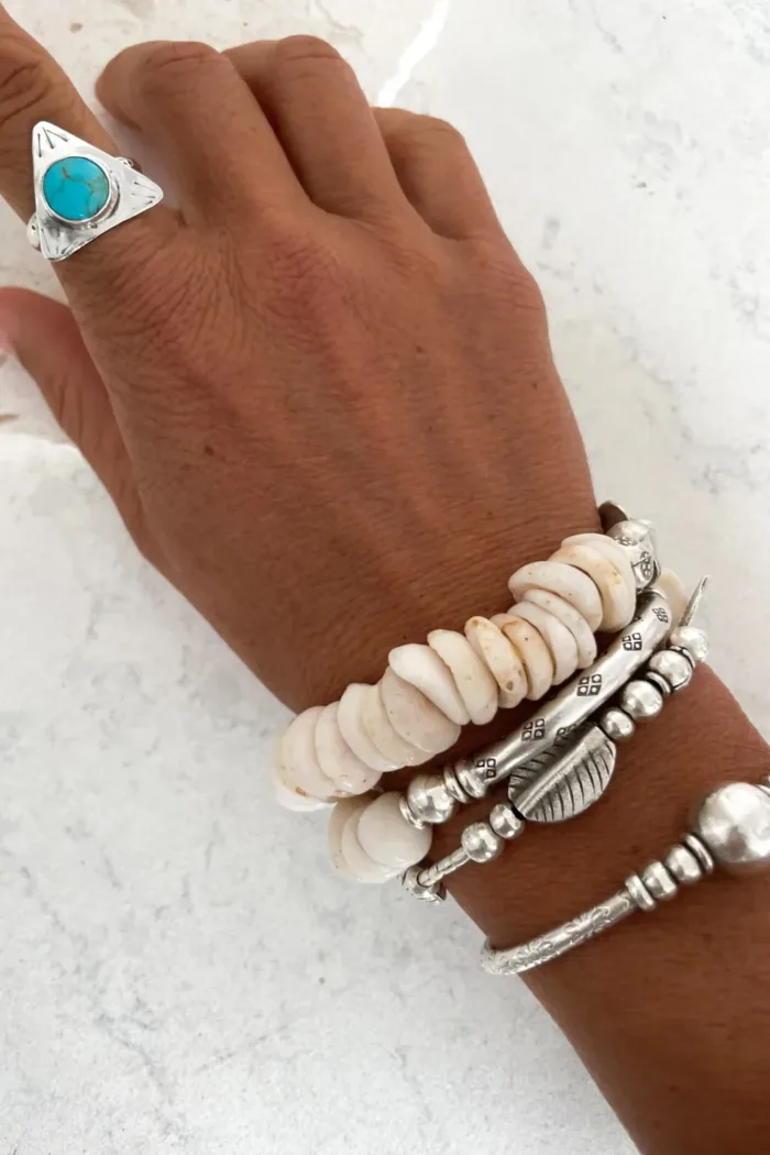 pure silver women's bracelet. heart and shell details - ocean safe. beach girl vibes