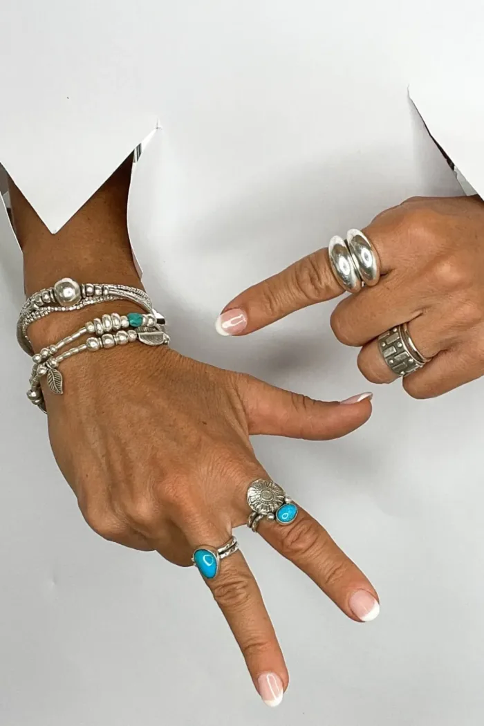 pure silver bracelet with turquoise gemstones. the perfect addition to add texture to your bracelet stack. ocean safe silver jewelry
