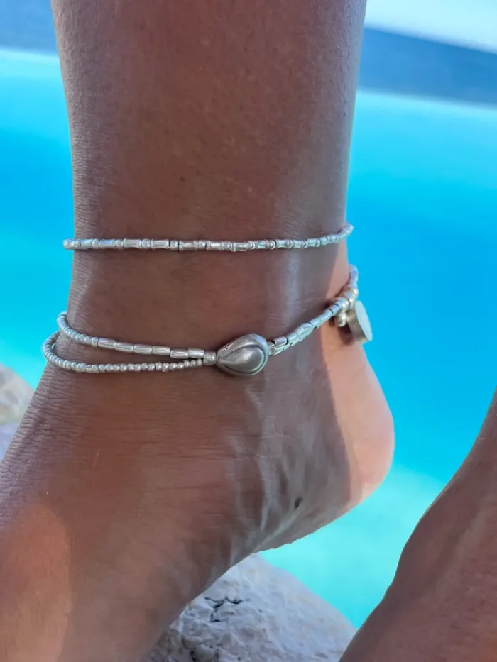 multi strand pure silver anklet. Ocean inspired with silver shell beads. The perfect beach jewellery. Staple, everyday jewellery. Ocean safe.