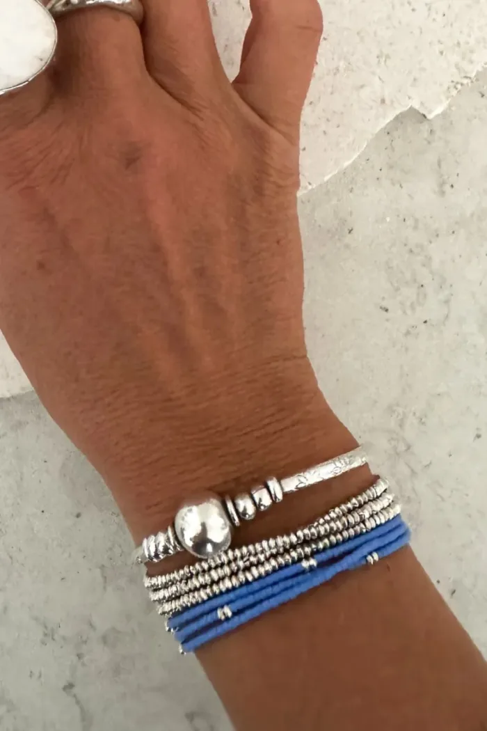 Handmade pure silver wrap bracelet featuring a bright summer colour seed bead of your choice – a great minimal wrap bracelet style for everyday wear