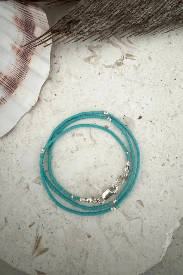 Handmade pure silver wrap bracelet featuring a bright summer colour seed bead of your choice – a great minimal wrap bracelet style for everyday wear
