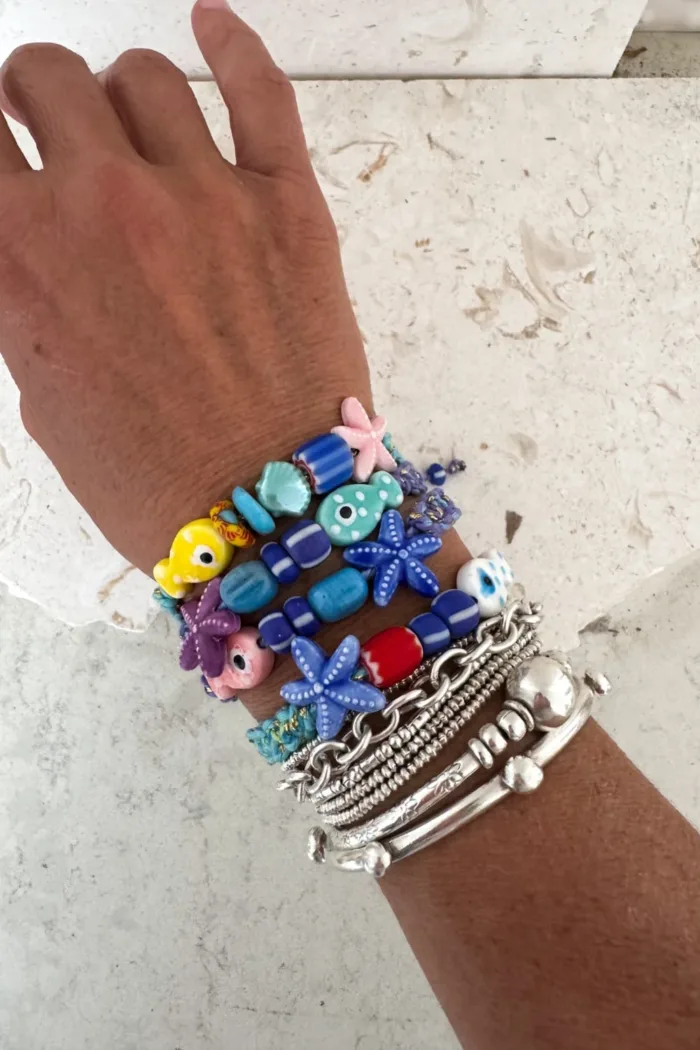 fish macrame bracelet adjustable colourful purple. perfect to add colour to a bracelet. stack this summer.