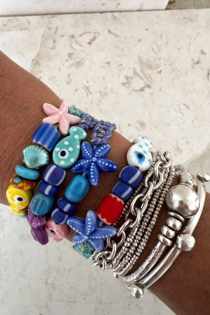 fish macrame bracelet adjustable colourful purple. perfect to add colour to a bracelet. stack this summer.
