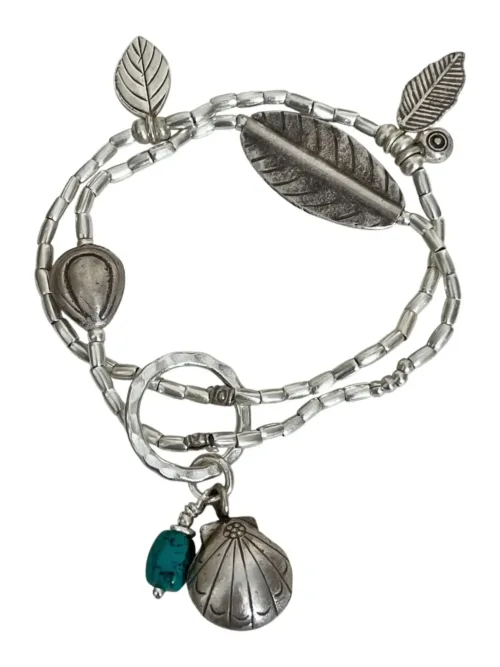 handmade bohemian style pure silver bracelet with turquoise gemstone tassel. Ocean safe. Stretch elastic - easy to slip on.