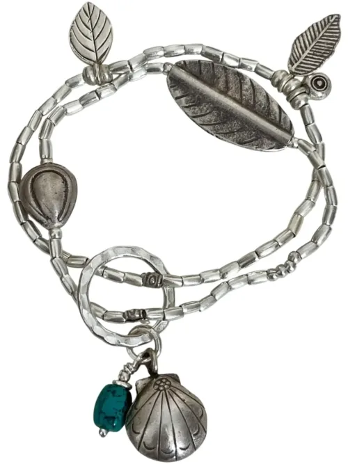 handmade bohemian style pure silver bracelet with turquoise gemstone tassel. Ocean safe. Stretch elastic - easy to slip on.
