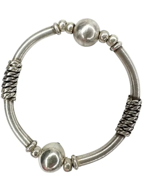 solid pure silver curve bar stretch bracelet. Easy to slip oxn and off. Ocean safe and strong. looks great in a bracelet stack