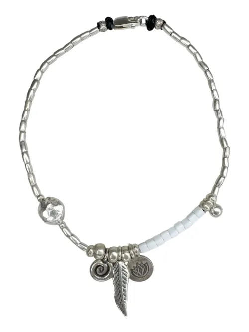 pure silver anklet with seed beads and spiral pure silver charm. Ocean safe. Silver jewellery for beach lovers.