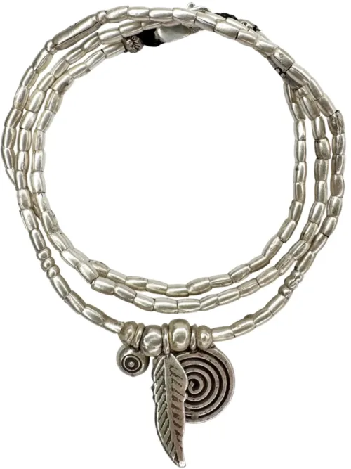 bohemian style silver jewellery. Pure silver wrap bracelet with silver spiral char, feather charm and eye protection charm - for a boho beach chic look- water safe for everyday wear. 3 styles in 1