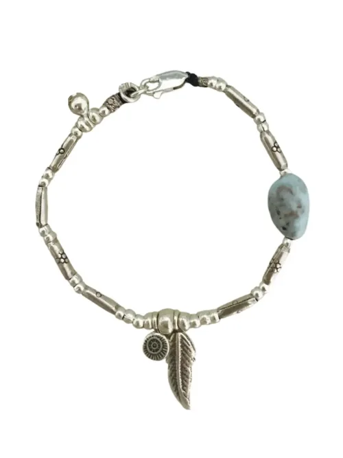 pure silver bracelet with silver feather charm and Larimar gemstone nugget. Wear everyday jewellery staple. Ocean safe.