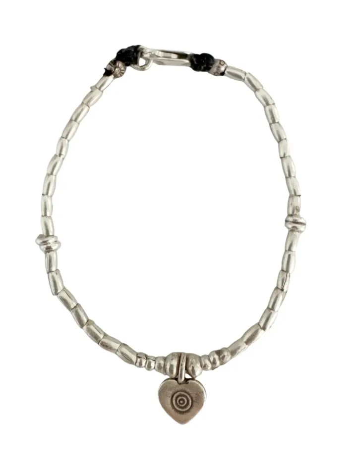 heart charm minimal style pure silver bracelet. Wear every day - ocean safe