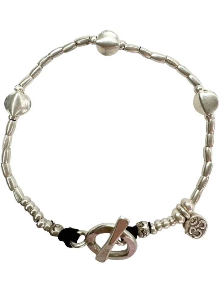 pure silver bracelet with small silver discs. tug proof - perfect for active mums. ocean safe