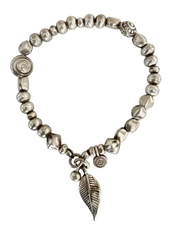 handmade pure silver bracelet. perfect for a bracelet stack. Stitch elastic so easy to slip on. ocean safe