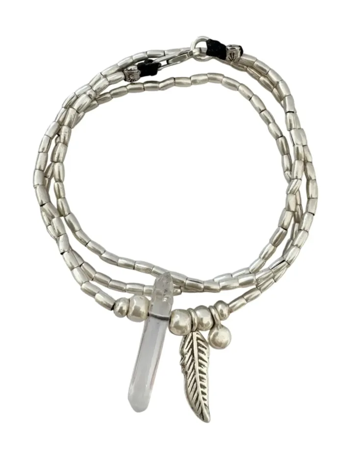 bohemian style silver jewellery. sterling silver wrap bracelet with crystal quartz and feather charm - water safe for everyday wear. 3 styles in 1