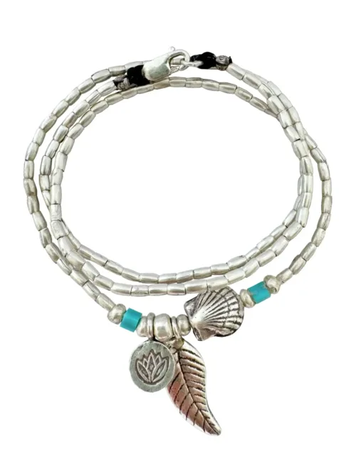 ocean inspired silver jewellery. Pure silver wrap bracelet with clam shell for a beach vibes look- water safe for everyday wear. 3 styles in 1