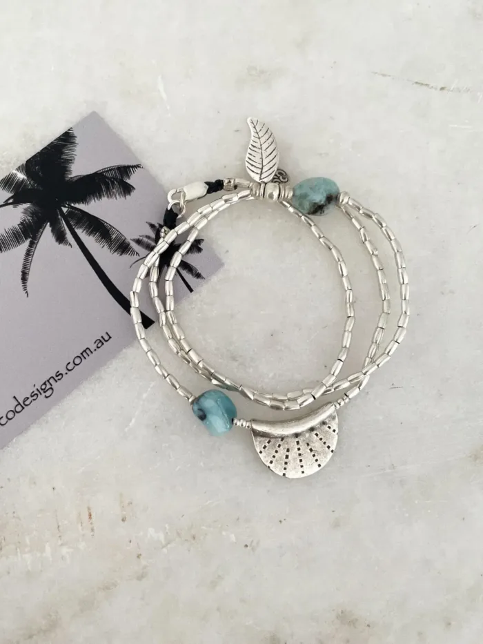 ocean inspired silver jewellery. Pure silver wrap bracelet with silver crescent disc and larimar gemstone - for a beach vibes look- water safe for everyday wear. 3 styles in 1