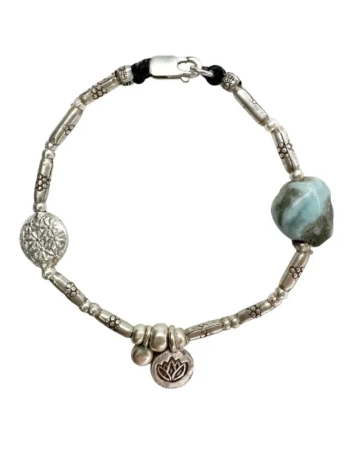 pure silver bracelet boho inspired with Larimar nugget gemstone. flower of life charm and lotus flower pendant. ocean safe.