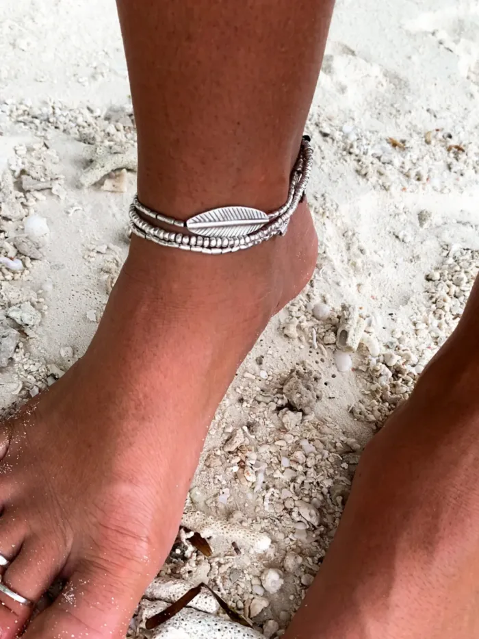 double strand pure silver anklet with large silver leaf and om charm. Ocean safe