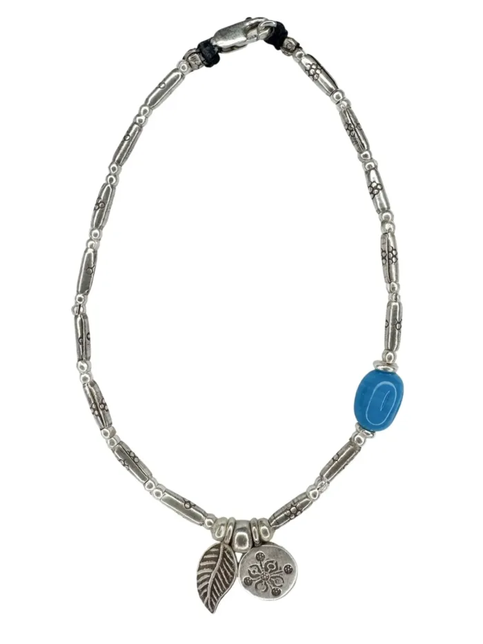 boho luxe pure silver anklet with sea blue glass bead and silver charms. Everyday staple jewellery - designed to wear everyday. Ocean safe