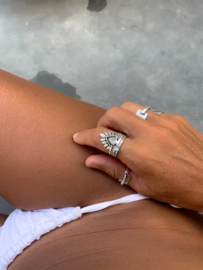 double stack sterling silver ring with crystal quartz and feather design. boho style. ocean safe