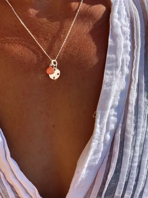 minimal style sterling silver necklace with petite round pendant and optional add on gemstone water safe