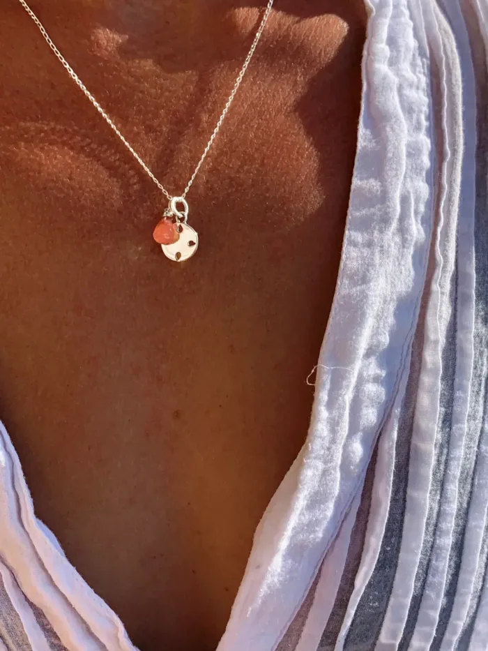 minimal style sterling silver necklace with petite round pendant and optional add on gemstone water safe