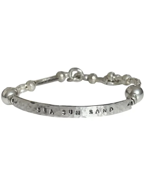 customisable hand stamped bracelet. sterling silver stretch bracelet for the active adventurer. water safe