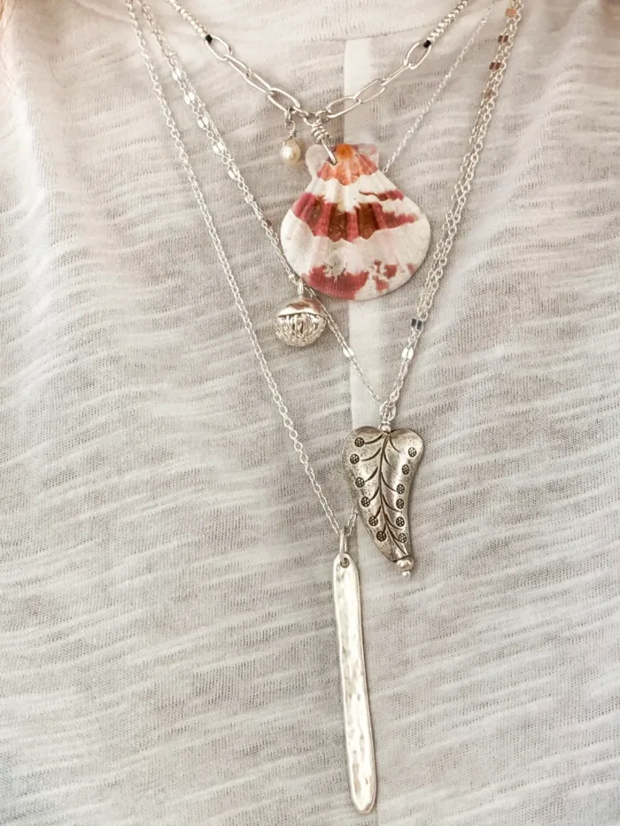 ocean inspired silver necklace with large clam shell pendant. Handmade in australia ocean safe. Perfect for layering in a necklace stack