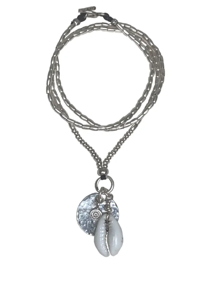 pure silver necklace with hand cut sterling silver round disc pendant and beach inspired cowrie shell pendant. Medium length necklace. beach vibes style. Ocean safe for everyday wear