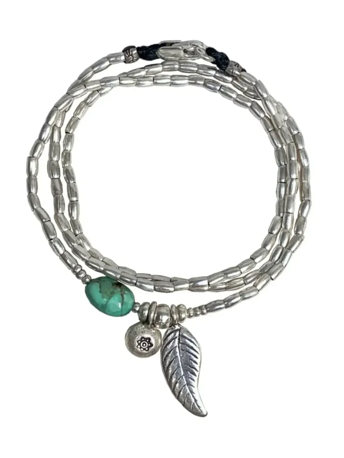 ocean inspired silver jewellery. Pure silver wrap bracelet with silver feather charm and chrysoprase gemstone - for a beach vibes look- water safe for everyday wear. 3 styles in 1. tug proof