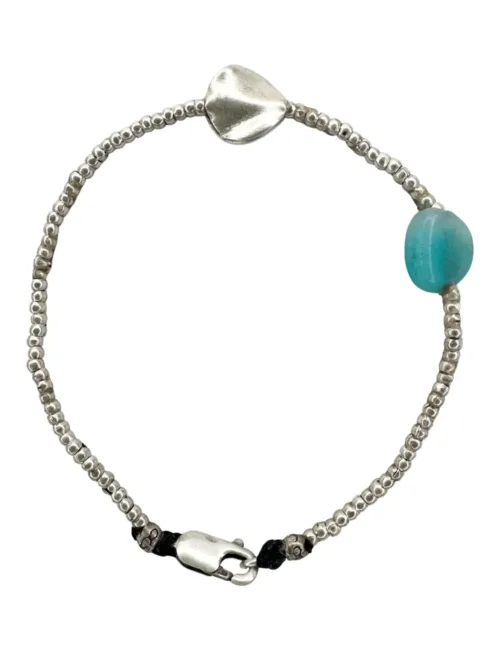 minimal style silver bracelet with small ammonite gemstone. ocean safe. rug proof - perfect for active mums