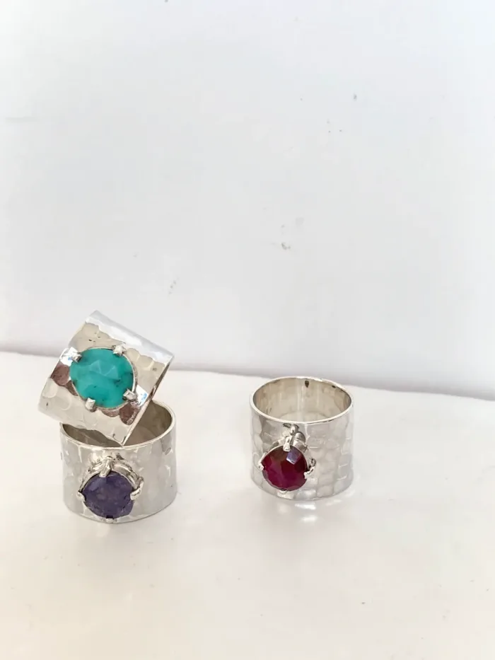 wide band sterling silver rings with rose cut gemstones purple tanzanite, red ruby and Arizona turquoise. ocean safe jewellery