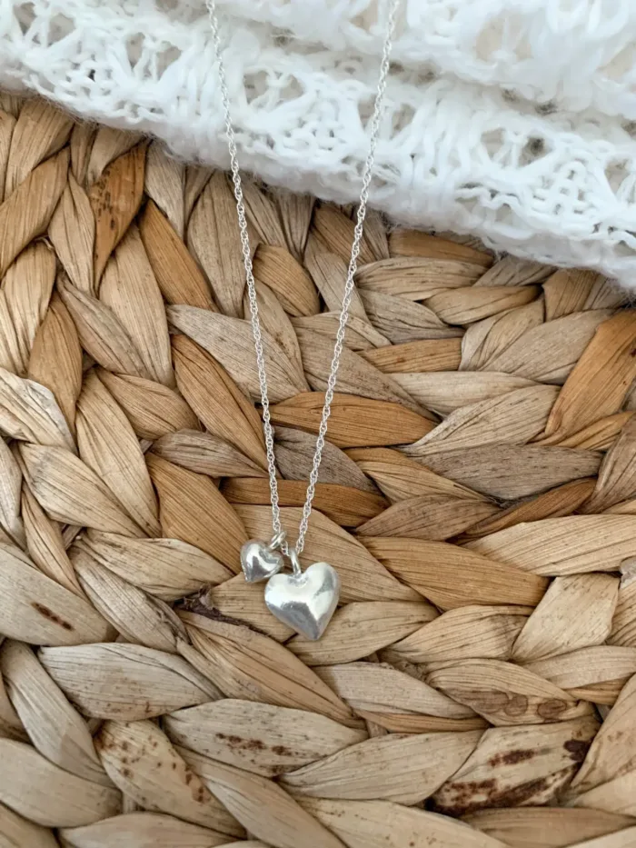 sterling silver 2 heart pendants on sterling silver chain ,animal style for everyday wear ocean safe