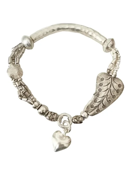chunky pure silver heart bracelet. multi layer and on a stretch elastic so its easy to slip on. perfect for a bracelet stack. ocean safe