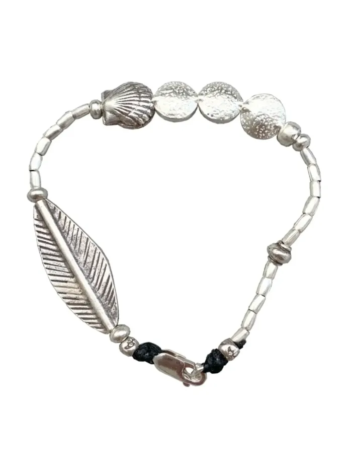 beach inspired pure silver bracelet with clam shell and large leaf. ocean safe. tug proof - perfect for active mums.