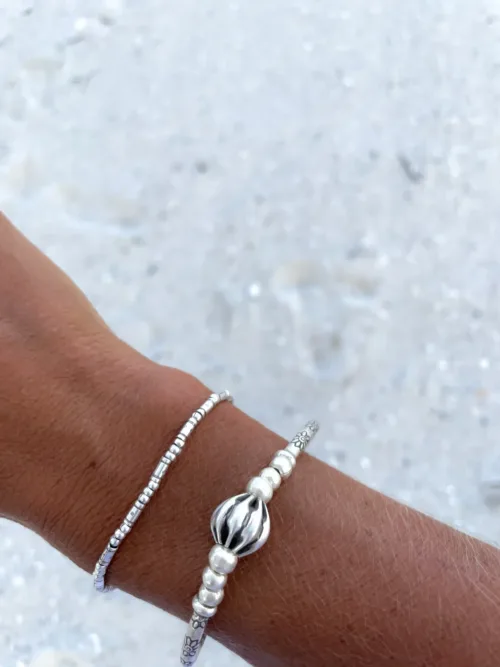 pure silver curve bar bracelet. Minimal style and great to add to a bracelet stack. Perfect for everyday wear. Ocean safe
