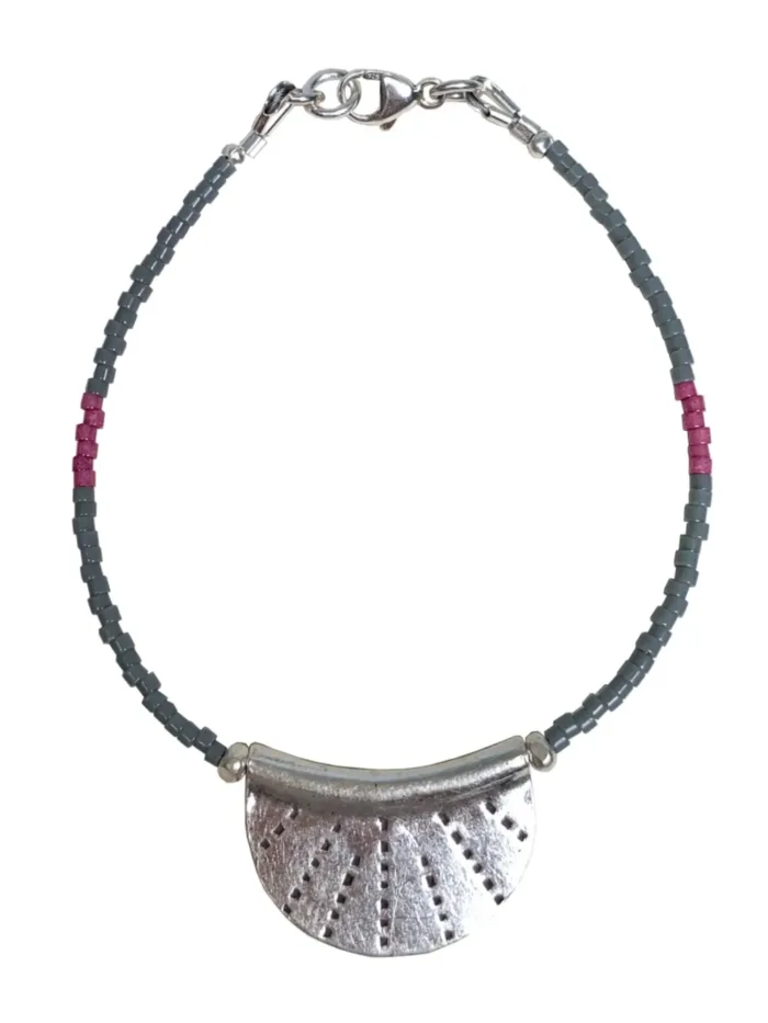 silver crescent disc with grey and pink seed bead. style this bracelet for a minimal look or a pop of colour to your bracelet stack