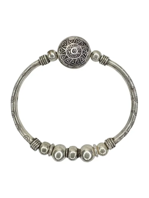 beach inspired pure silver curve bar stretch bracelet with silver disc centre. perfect for everyday wear and bracelet stacking. ocean safe