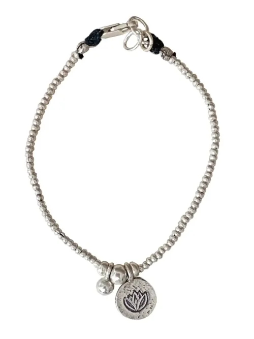 pure silver bracelet with lotus flower pendant. tug proof - perfect for active mums. ocean safe