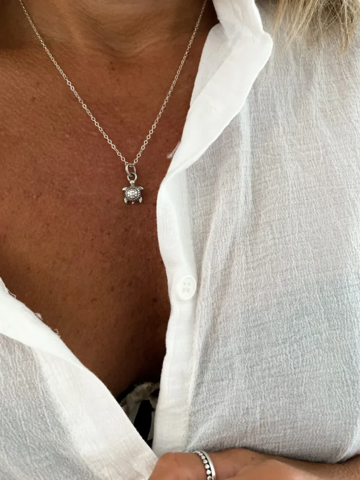 ocean inspired petite sterling silver sea turtle pendant necklace on sterling silver curb chain ocean safe