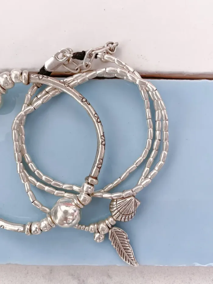 ocean inspired silver jewellery. Pure silver wrap bracelet with clam shell for a beach vibes look- water safe for everyday wear. 3 styles in 1