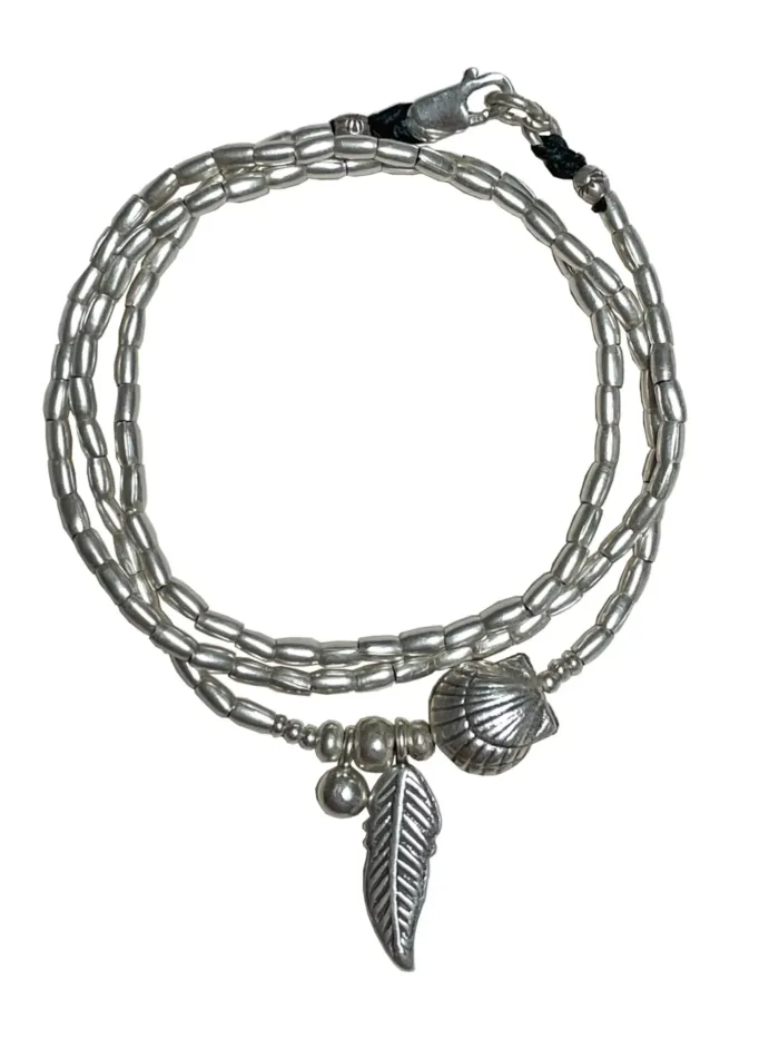 ocean inspired silver jewellery. Pure silver wrap bracelet with clam shell for a beach vibes look- water safe for everyday wear. 3 styles in 1