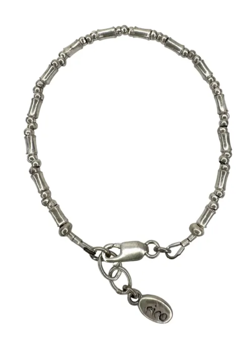 pure silver bracelet perfect two add texture to a bracelet stack. bamboo like silver minimal style bracelet