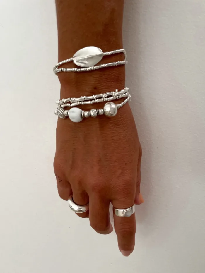 pure silver bracelet perfect two add texture to a bracelet stack. bamboo like silver minimal style bracelet