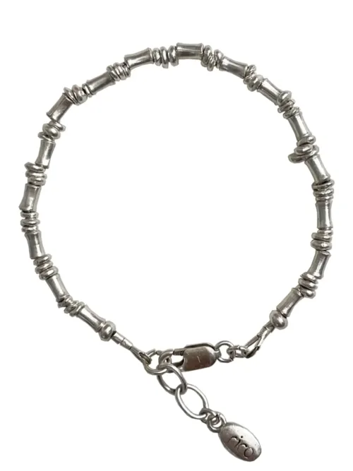 pure silver bracelet perfect two add texture to a bracelet stack. bamboo like silver minimal style bracelet