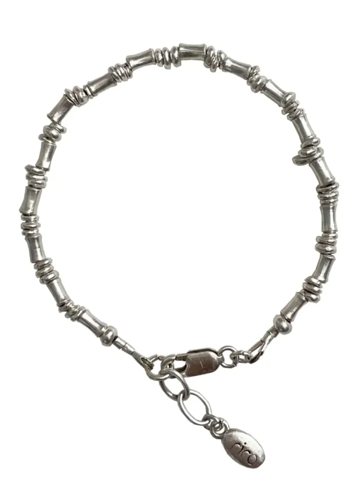 pure silver bracelet perfect two add texture to a bracelet stack. bamboo like silver minimal style bracelet