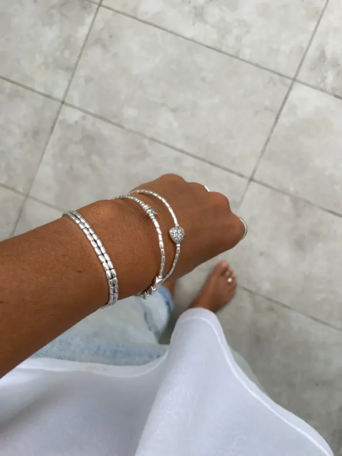 memory wire double wrap bracelet with pure silver and silver heart charms. Customisable charm pendant