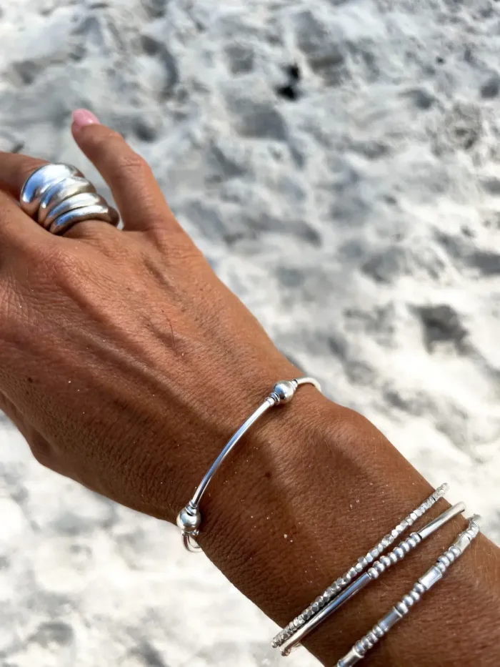 pure silver memory wrap bracelet perfect two add texture to a bracelet stack. small silver balls with sterling silver curve tubes. minimal style bracelet