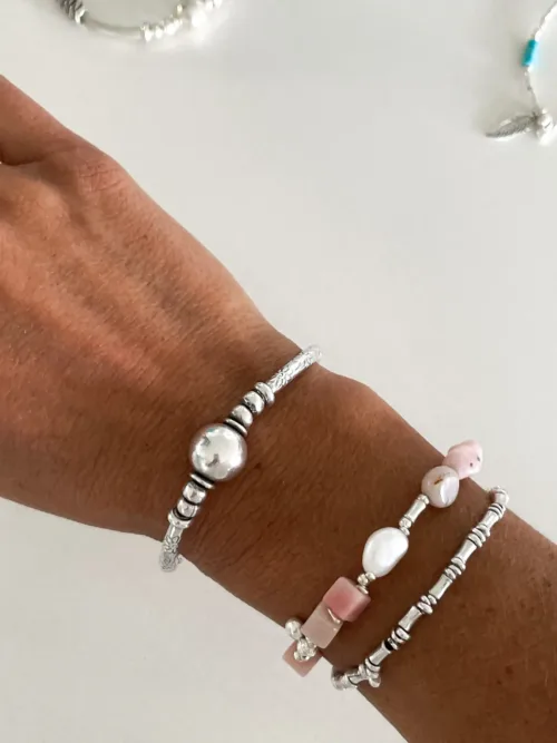 pink opal gemstone and silver women's bracelet. looks great worn by itself or in a bracelet stack.