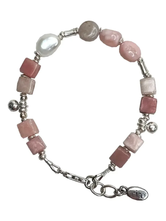 pink opal gemstone and silver women's bracelet. looks great worn by itself or in a bracelet stack.